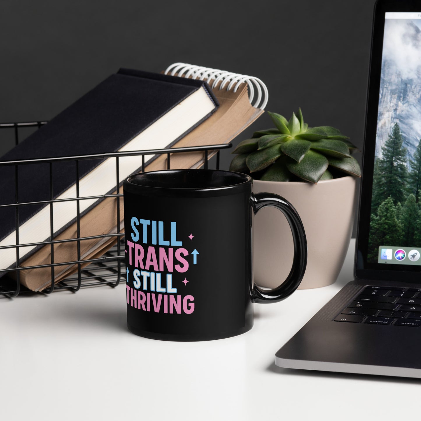 Ceramic pride mug with unique LGBTQ+ slogan: Still Trans, Still Thriving - Mug