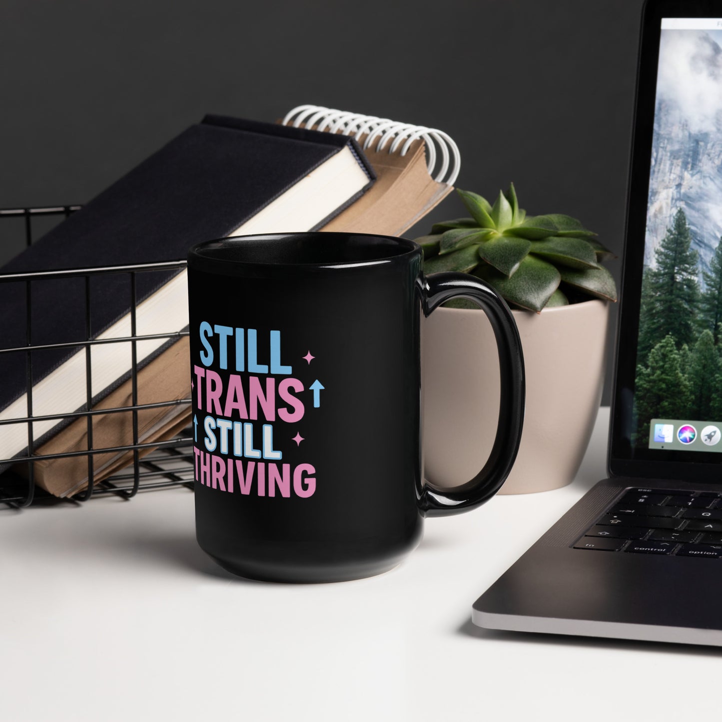 Ceramic pride mug with unique LGBTQ+ slogan: Still Trans, Still Thriving - Mug