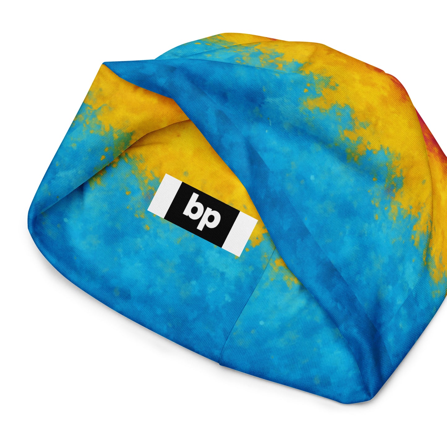 Warm pride beanie featuring flag-inspired graphics: Pansexual Pride Paint Splash Beanie